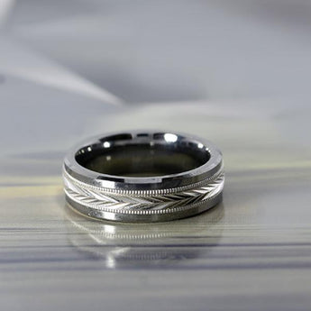 7mm tungsten and 10 karat white gold ring with etching and milgrain inlay, by madani