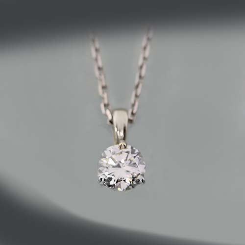 14 karat white gold, 0.49 carat diamond solitaire, estate pendant necklace