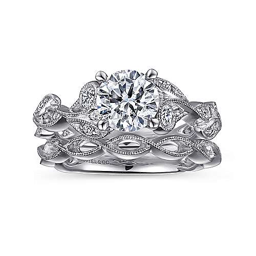 Gabriel & Co. 14K White Gold Flower Diamond Engagement Ring paired with a Gabriel & Co. band
