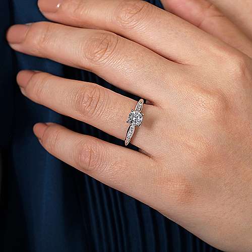 Gabriel & Co. White Gold Round Diamond Engagement Ring on a woman's hand