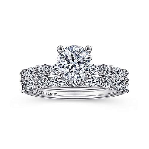 Gabriel & Co. 14K White Gold Circular Diamond Engagement Ring paired with diamond Gabriel & Co. band