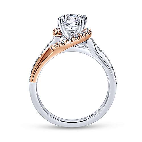 14 karat white and rose gold swirl engagement ring with milgrain and diamond accents. Centre stone not included. By Gabriel and Co