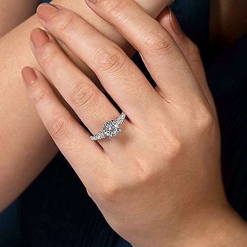 14 karat white gold graduated double row diamond accented engagement ring by Gabriel & Co. Centre stone not included.