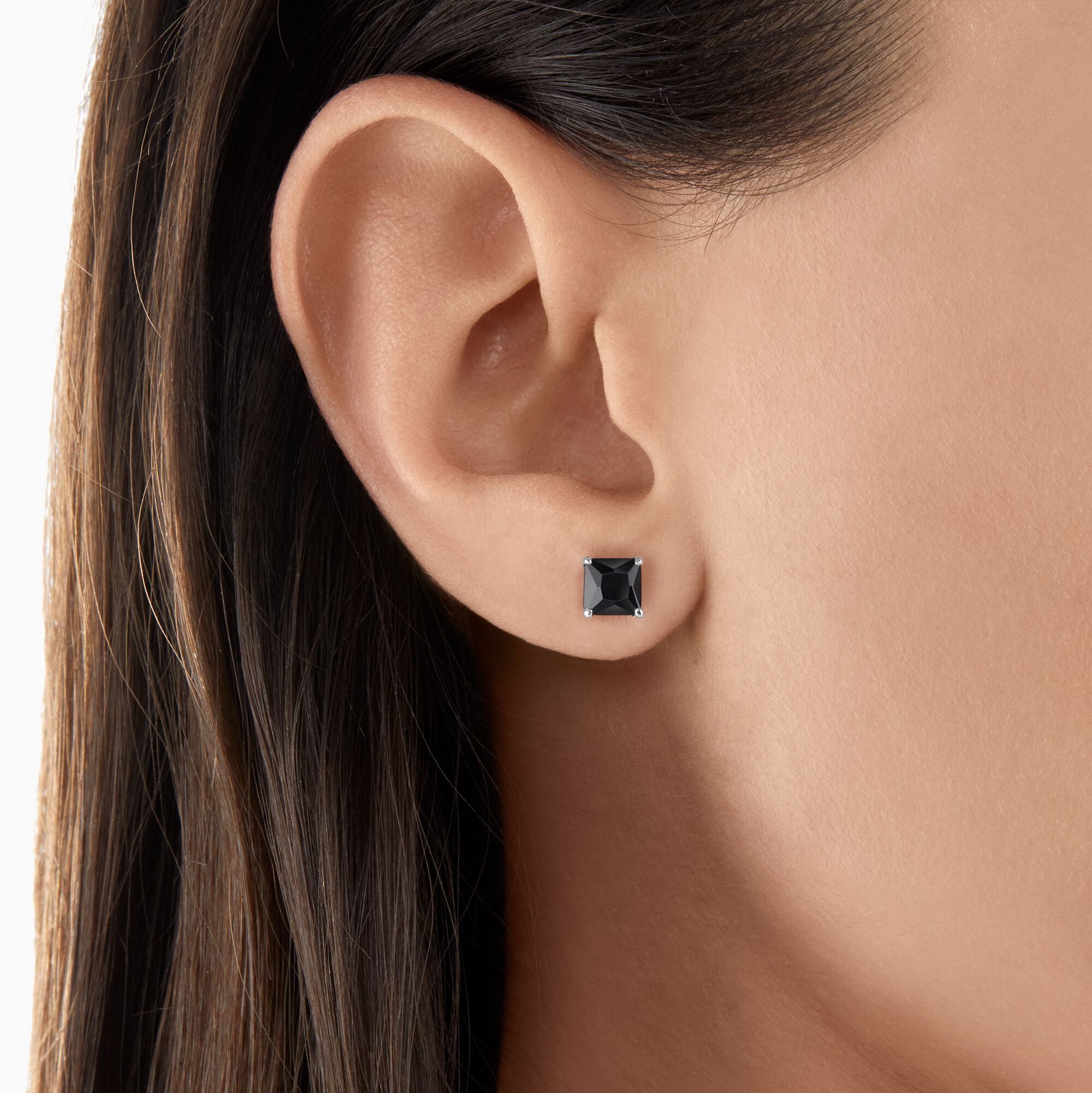 Thomas Sabo Square Cut Black Onyx Ear Studs worn by a woman