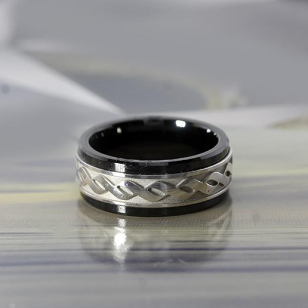 9mm black ceramic and 10 karat white gold ring with infinity design inlay by madani